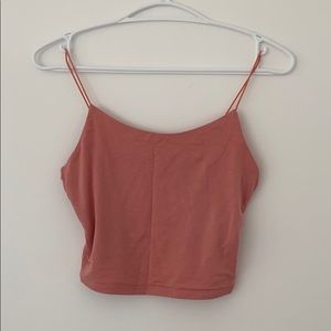 pinkish orange cropped bungee tank top from garage